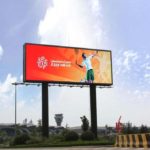 Large billboard/ digital message sign with tennis player