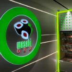 Round Green Neon Sign and sushi graphic for Japanese restaurant "Wasabi"