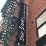 Vertical Hanging banner/ sign for "Sister Jane East Side Tavern"